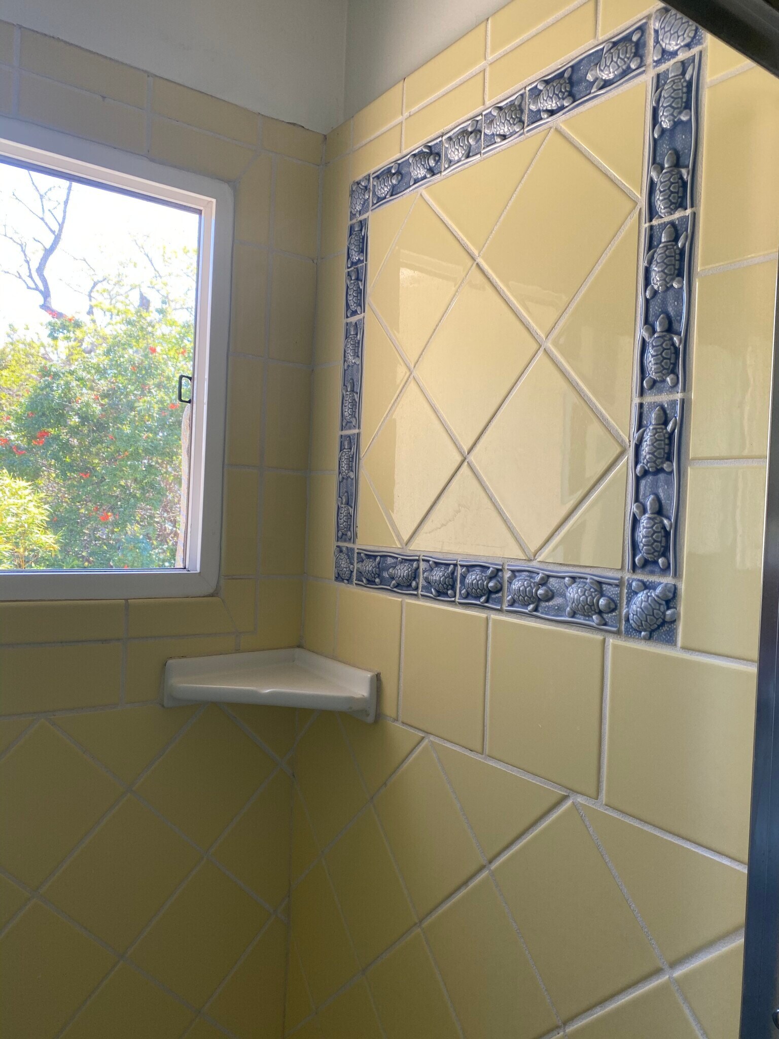 Private clear window in the bathroom, looking out to nature - 1859 1/2 Pandora Ave