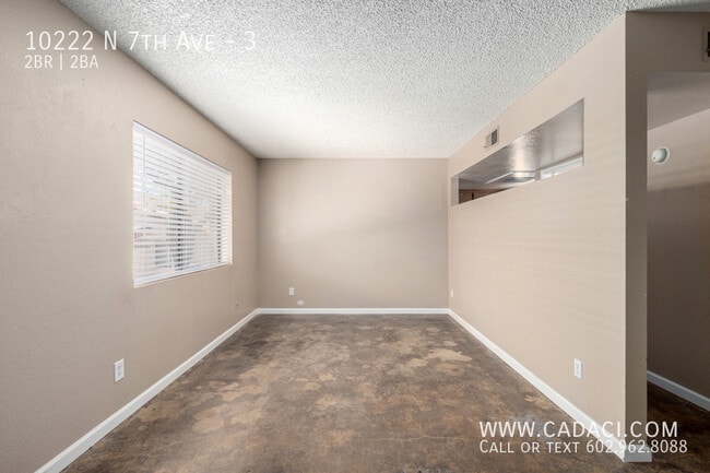 Building Photo - 10222 N 7th Ave