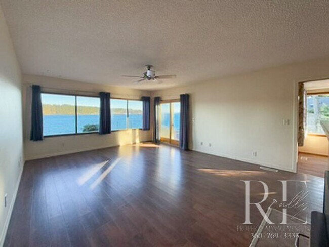 Building Photo - Waterfront Bliss: Stunning Puget Sound Views & Your Own Private Beach!