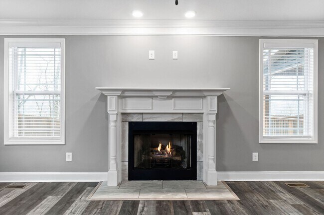 Building Photo - Pet Friendly Three Bedroom with Bonus!