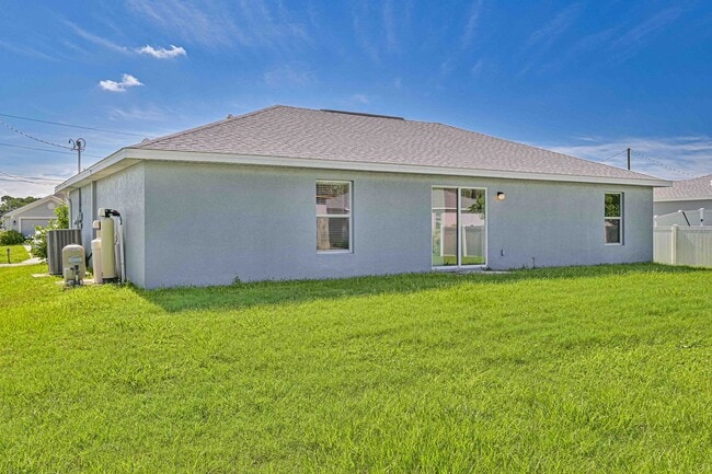 Building Photo - Spacious Three-Bedroom Home with Open Floor Plan, Large Yard