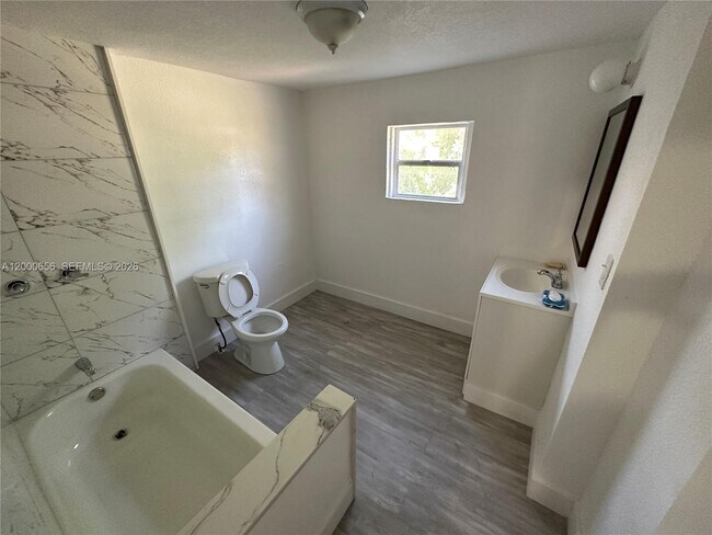 Building Photo - 5646 NW 3rd Ave