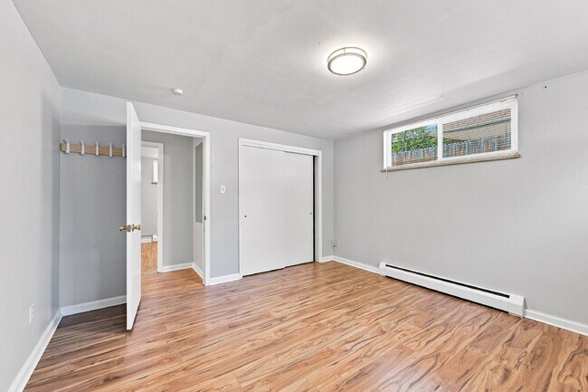 Building Photo - AVAILABLE NOW  Spacious 4-Bedroom Wheat Ridge Home with Finished Garden Level, Two-Car Garage & B...