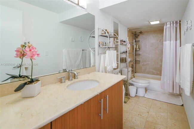 Building Photo - 10275 Collins Ave