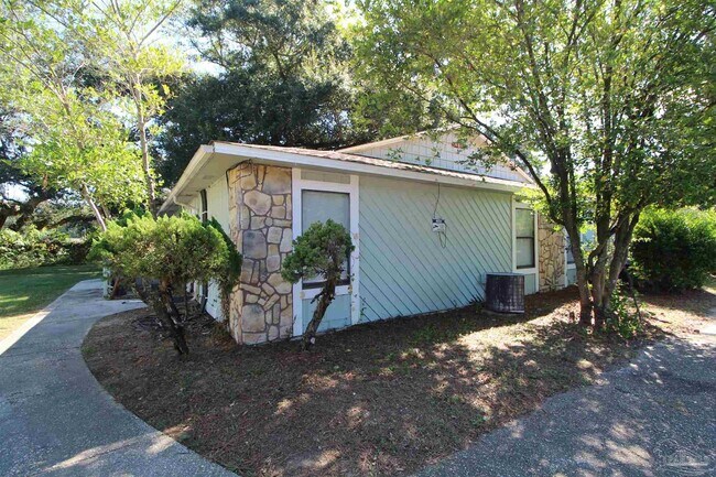 Building Photo - 6810 Tiki Ln