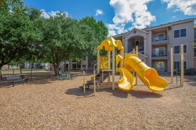 Fun Outdoor Playground at Avonmora Apartments in Austin, TX - Avonmora Apartments
