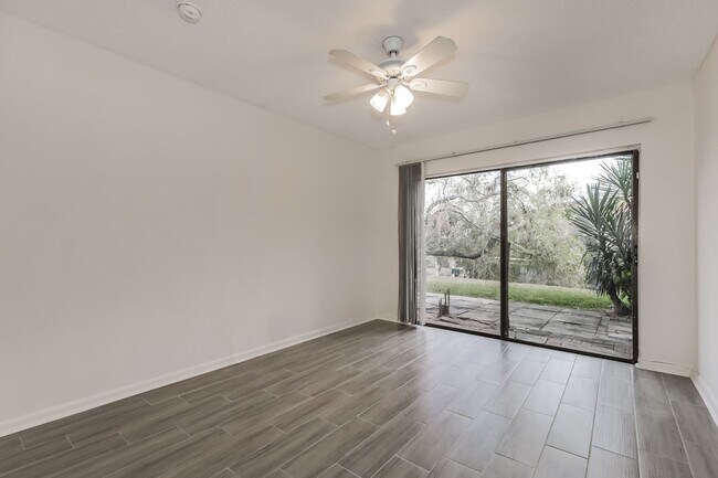 Building Photo - 3 BR / 2 BA Ground-Floor Condo | Screened ...