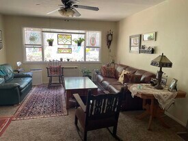 Inviting Living room with large picture window - 125 Pleasant Ave