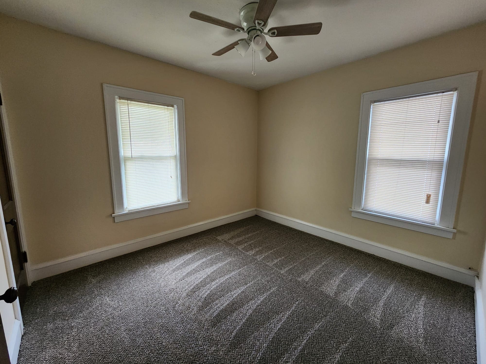 Second carpeted room- perfect for an office or a second bedroom - 1382 Webb Rd