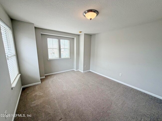 Building Photo - 8880 Grassy Bluff Dr