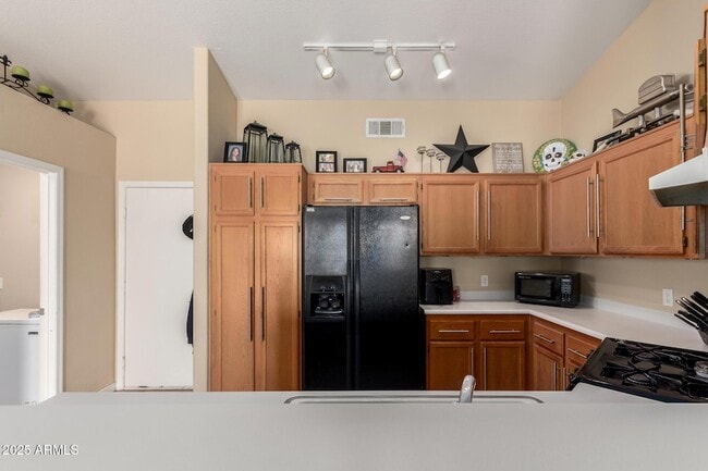 Building Photo - 8375 W Dahlia Dr