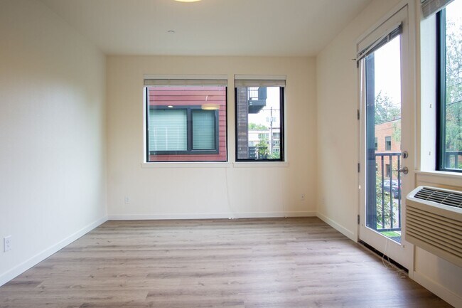 Building Photo - Modern & Chic Corner 1-Bed w/Private Balcony!