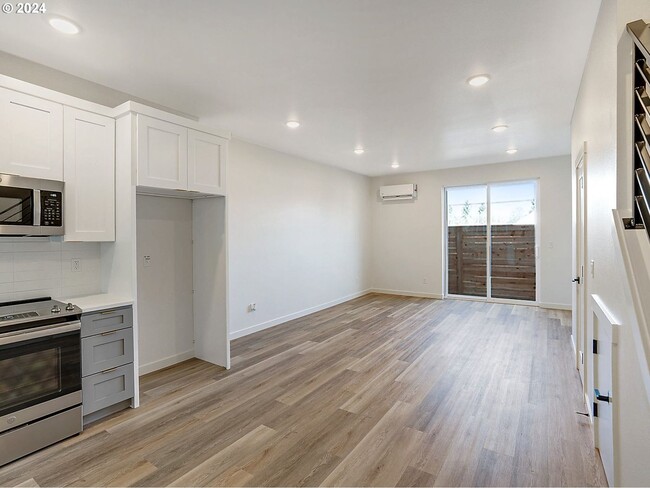 Building Photo - Inviting Home with Open Living & Stainless Steel Kitchen