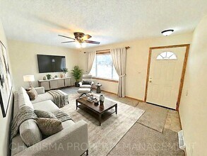 Building Photo - 4 BD, 2 BA - FENCED IN YARD, PRIVATE TRAILS, FINISHED UPPER AND LOWER LIVING AREAS, ATTACHED GARAGE!