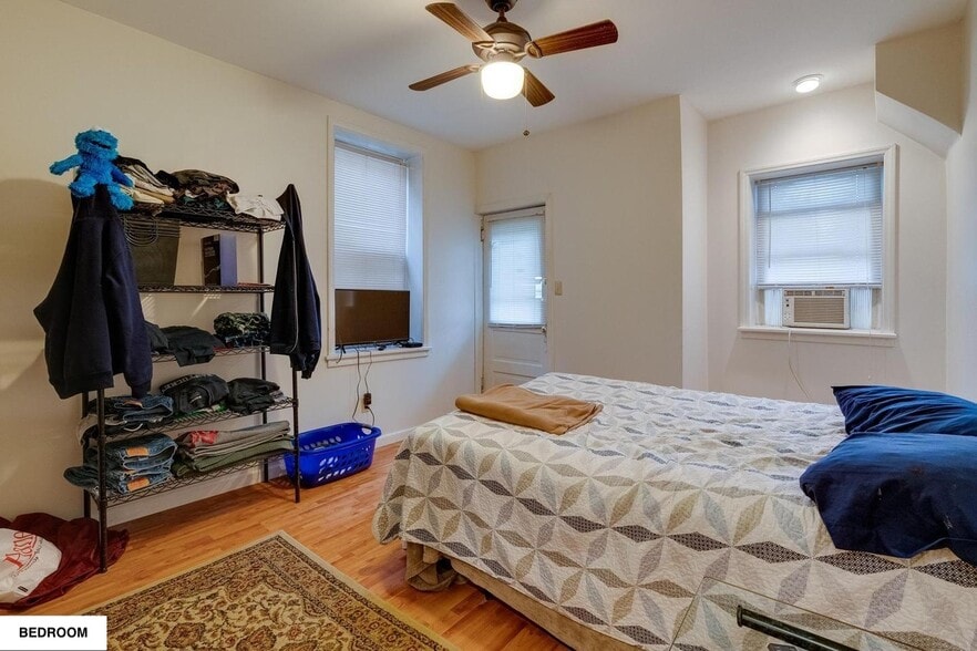 Bedroom with full-size closet. - 513 1/2 W James St