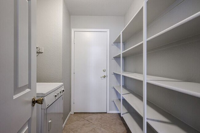 Building Photo - Introducing a stunning 4-bedroom, 2.5-bath...