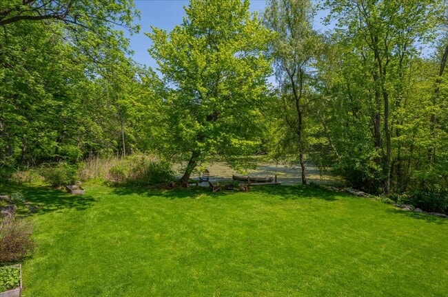 Building Photo - Stunning Updated Home with Private Pond Views in Chappaqua