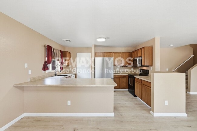Building Photo - Bright Open Spaces & a Backyard You'll Love