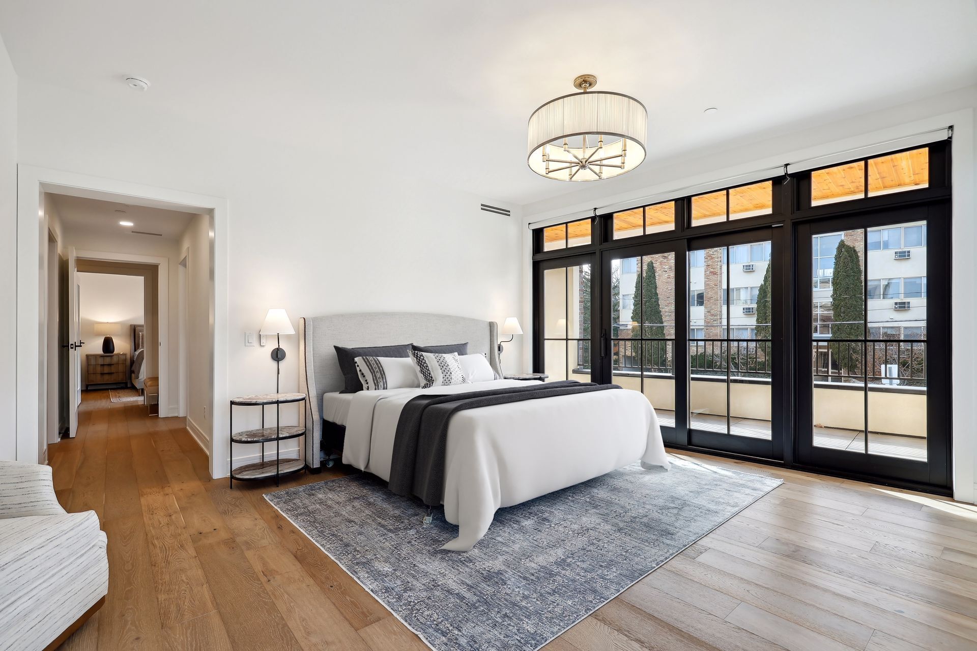 Spacious primary bedroom with access to the balcony - 511 2nd St