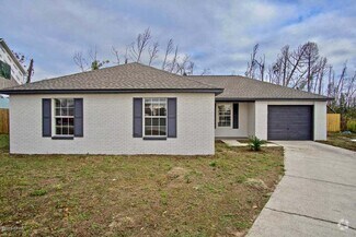 Building Photo - "Charming 4-Bedroom Home in Panama City wi...