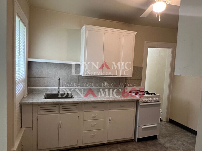 Building Photo - Studio with Bathroom - All Utilities Paid ...