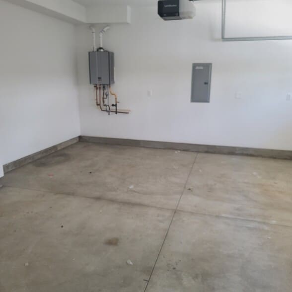 Two car EV Ready enclosed garage and tankless water heater - 13826 Bessemer St