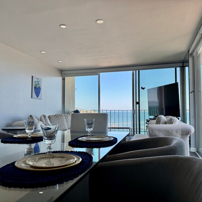 Building Photo - Just Unpack, Pour a Beverage, & Cue the Su...