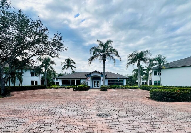 Building Photo - Lakefront Luxury in North Naples – Elegant...