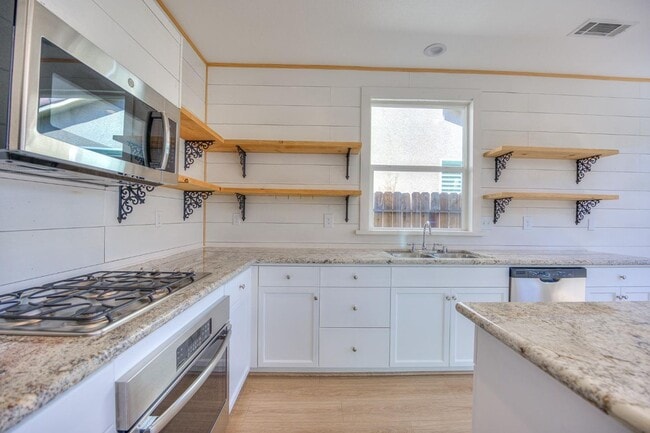 Building Photo - Spacious 3-Bedroom Home with a Backyard in Harlan Ranch Community!