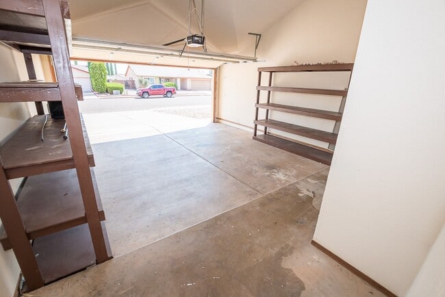 Building Photo - Contemporary home with 3 bedrooms, 2 bath, 2 car garage, A/C, Fenced Yard