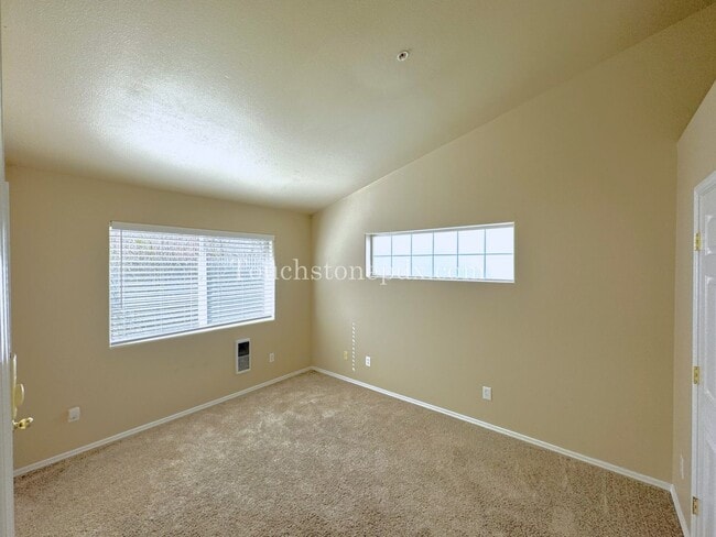 Building Photo - Light Filled 3 Bedroom Townhome with Deck, Attached Garage, and AC