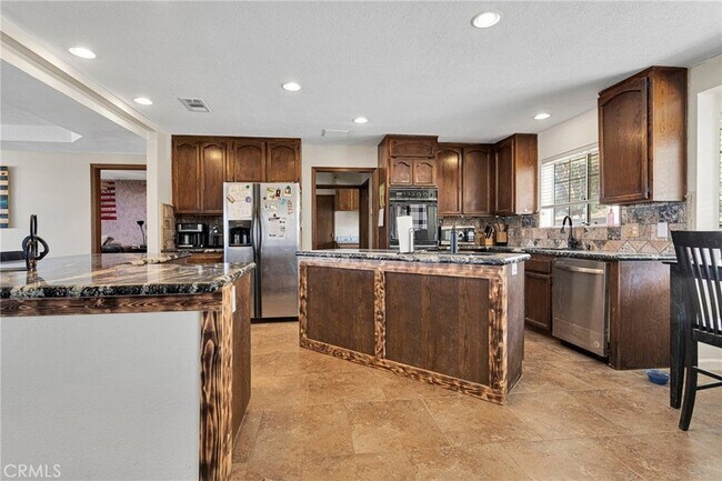 Building Photo - 25733 Roundup Way