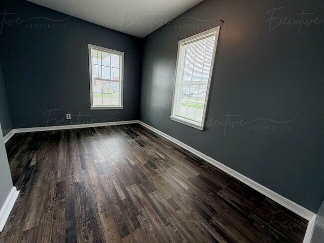 Building Photo - Move-In Ready in Sulphur | Updated 2BR Home w/ Covered Front Porch + Granite Countertops