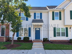 Building Photo - Inviting Townhome with En-Suite Secondary Bedroom, Back Patio & Community Pool – Raleigh Location