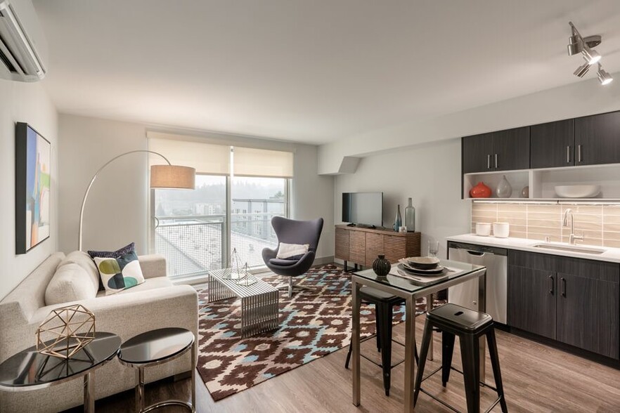 Floor-to-ceiling windows with solar shades in South Building apartments - Metro 112 Apartments