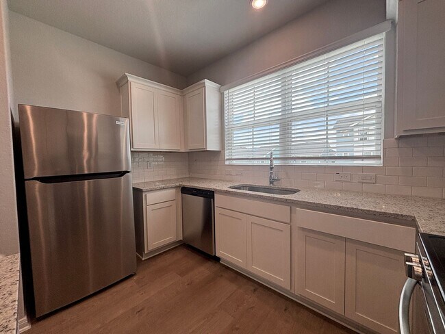 Building Photo - Triple Master Suites 3-Story Townhome