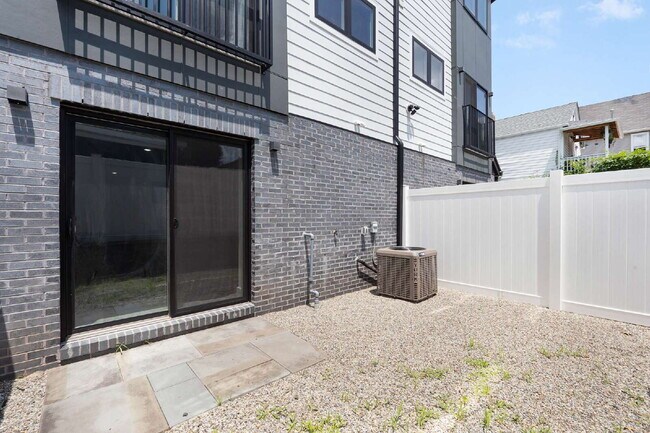 Building Photo - Movie in special, first 1/2 month rent is FREE! Charming 2-Bedroom Condo with 2 Full & 2 Half Bat...