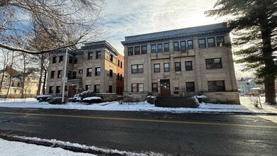 Building Photo - 4 Bedrooms 1.5 Bath Apartment with Heat and Hot Water Included!