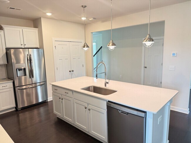Building Photo - Beautiful Westbranch Home with 2-Car Garage, Covered Porch & Greenway Entrance Across the Street
