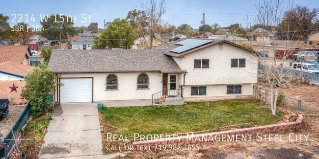 Building Photo - Spacious 5-Bedroom Home with Solar Panels ...