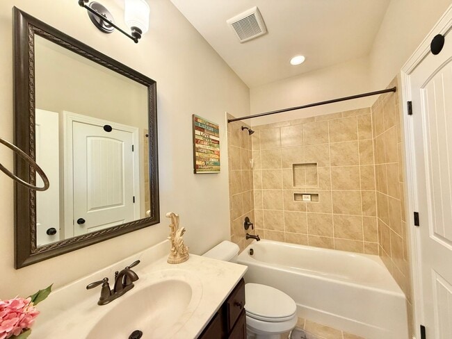 Building Photo - Luxurious 3BD, 4BA Raleigh Townhome with a First Floor Master Bedroom, Bonus Sunroom, and Large U...