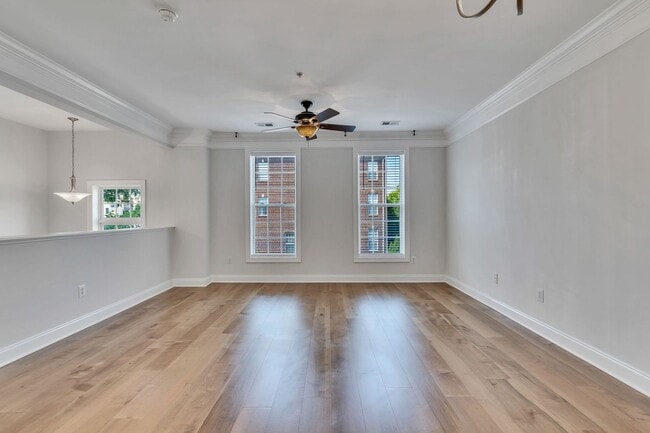 Building Photo - Spacious End Unit with Garage in Gated Com...
