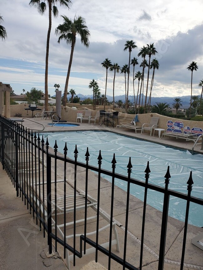 Building Photo - SEASONAL WITH POOL JANUARY - MARCH 2026