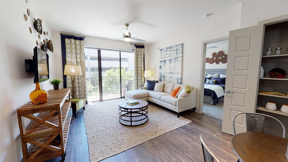 Expansive Living Room - Eleven10 at Farmers Market Apartments