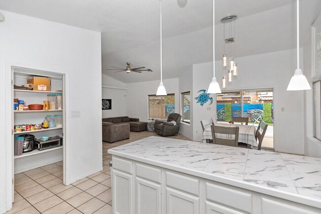 Building Photo - "3-Bedroom, 2-Bathroom Solar Home with a Pool in Mesa Del Sol!"