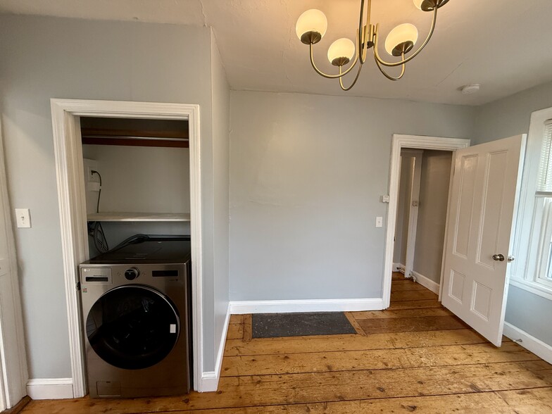 Bedroom with in-unit laundry - 74 John St