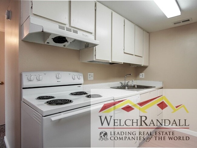 Building Photo - Your Roy Condo Retreat – 2 Bed, 1 Bath, Mo...