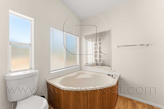 Building Photo - Spacious 3 Bedroom Home with Large Fenced Yard and Two-Car Garage