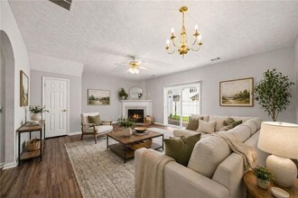 Building Photo - 3-bedroom, 2.5-bath end-unit townhome in the Garrison Square