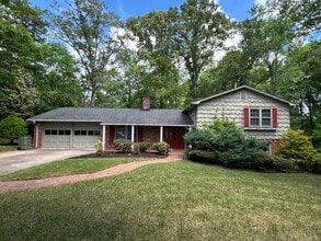 Building Photo - Spacious Multi-Level Brick Home